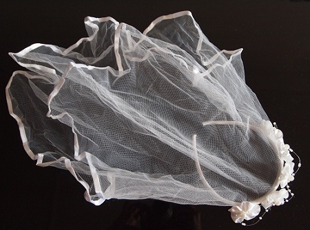 Flower girl hairband with veil.jpg