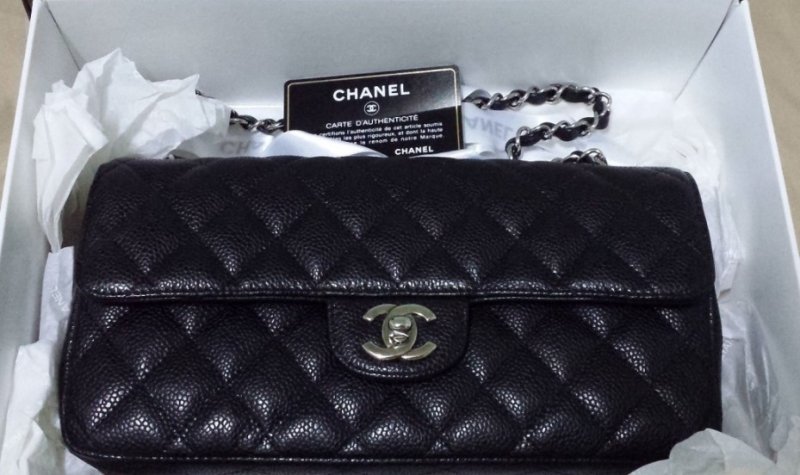 Chanel east west flap front bag.jpg