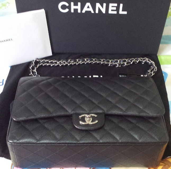 Chanel maxi caviar double flap.jpg