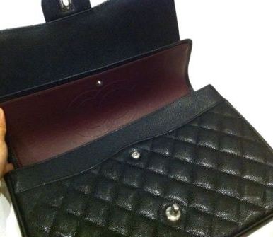 Chanel maxi caviar double flap interior.jpg